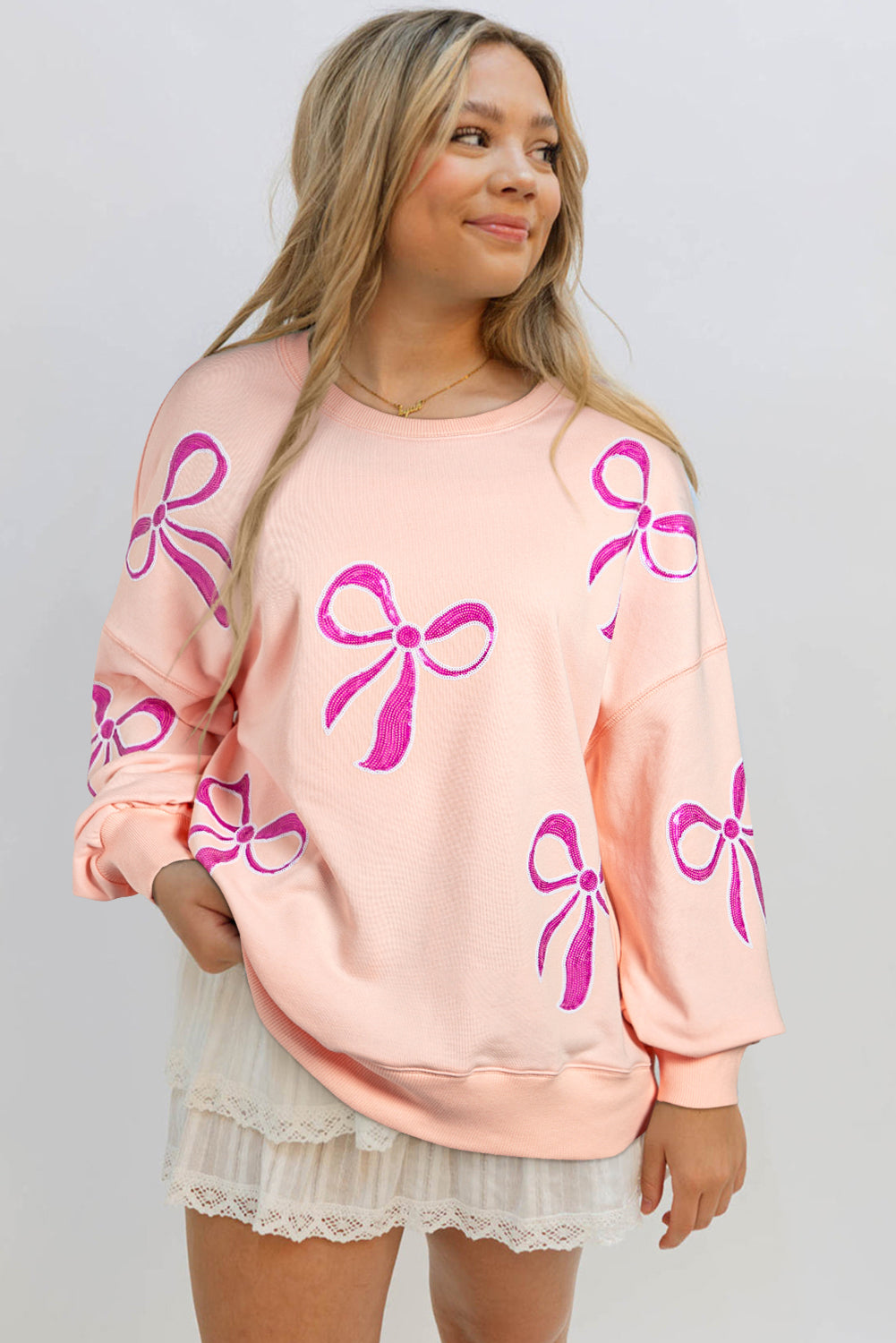 Sequined Bowknot Drop Shoulder Oversized Sweatshirt