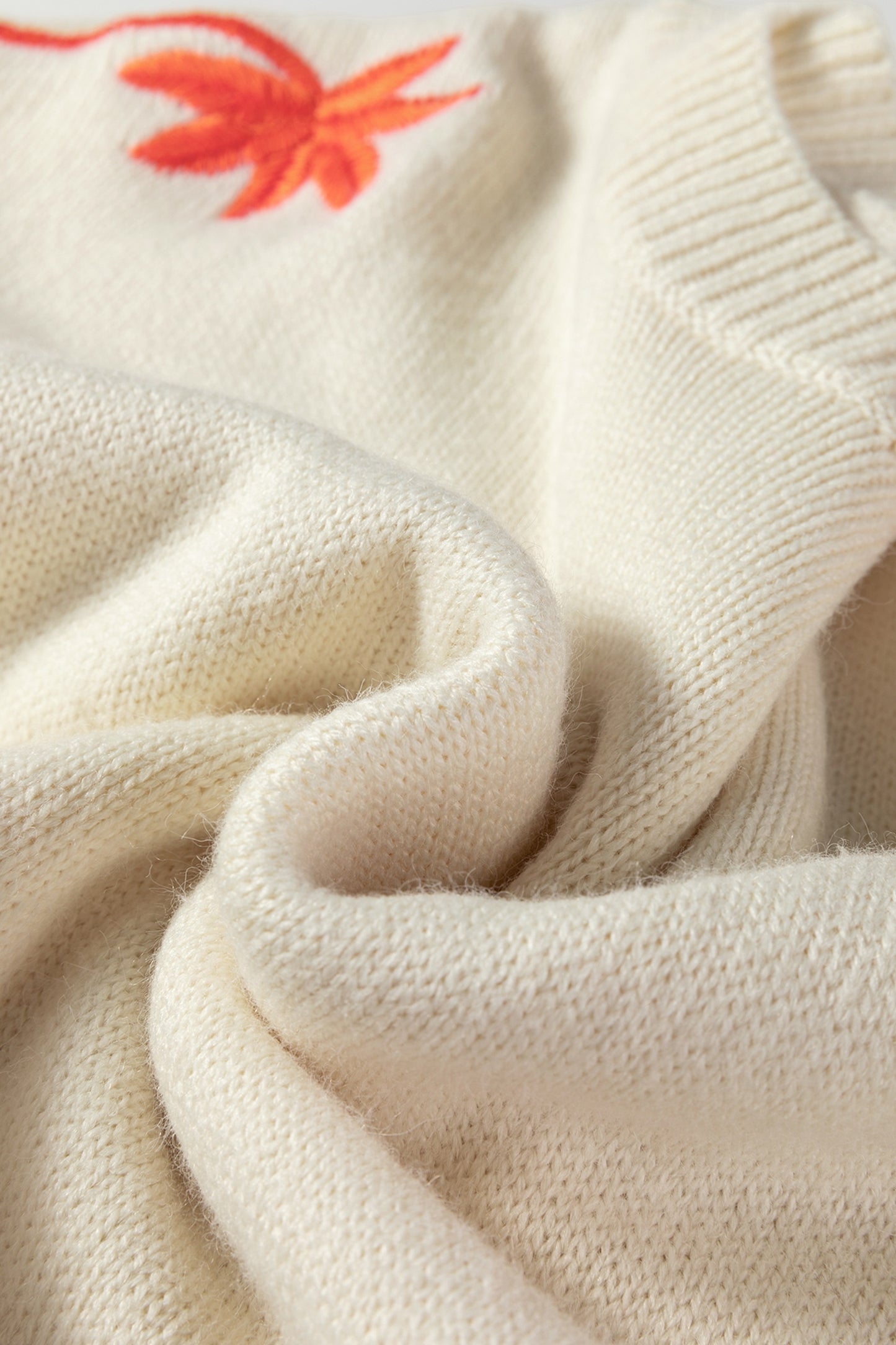 Embroidered Floral Sleeve Round Neck Loose Sweater