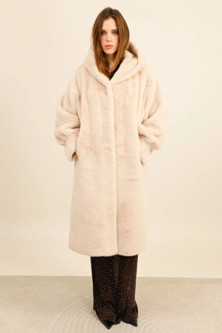 Long hooded coat in premium faux fur